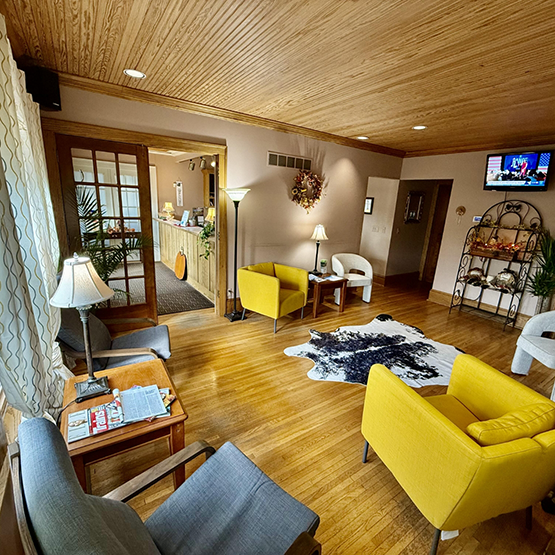Dental office waiting area with homey decor