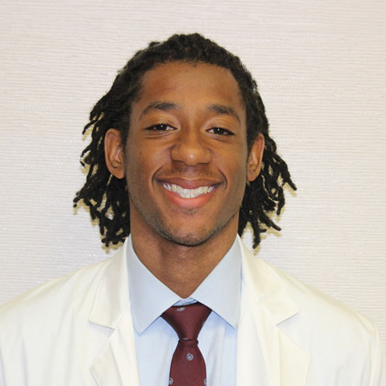 Maplewood joyful dentist Doctor Quintarias Lester smiling
